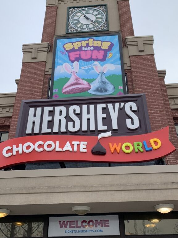 This image has an empty alt attribute; its file name is Hersheys-Chocolate-World-entrance-768x1024.jpg